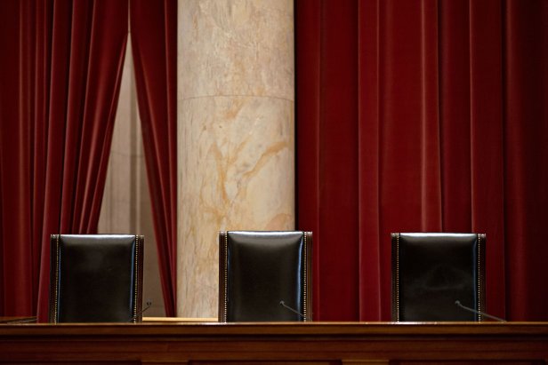 The chairs of U.S Supreme Court Justices Neil Gorsuch, from left, Sonia Sotomayor and Stephen Breyer sit behind the courtroom bench in Washington, on July 9, 2019.