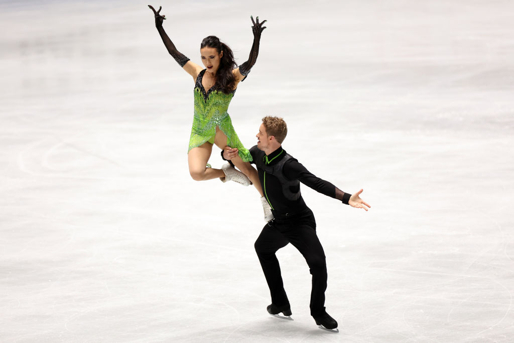 Madison Chock and Evan Bates of Team USA compete in the Ice Dance Rhythm Dance during the ISU Grand Prix of Figure Skating-NHK Trophy at Yoyogi National Gymnasium on Nov. 12, 2021 in Tokyo. (Atsushi Tomura—International Skating Union via Getty Images)