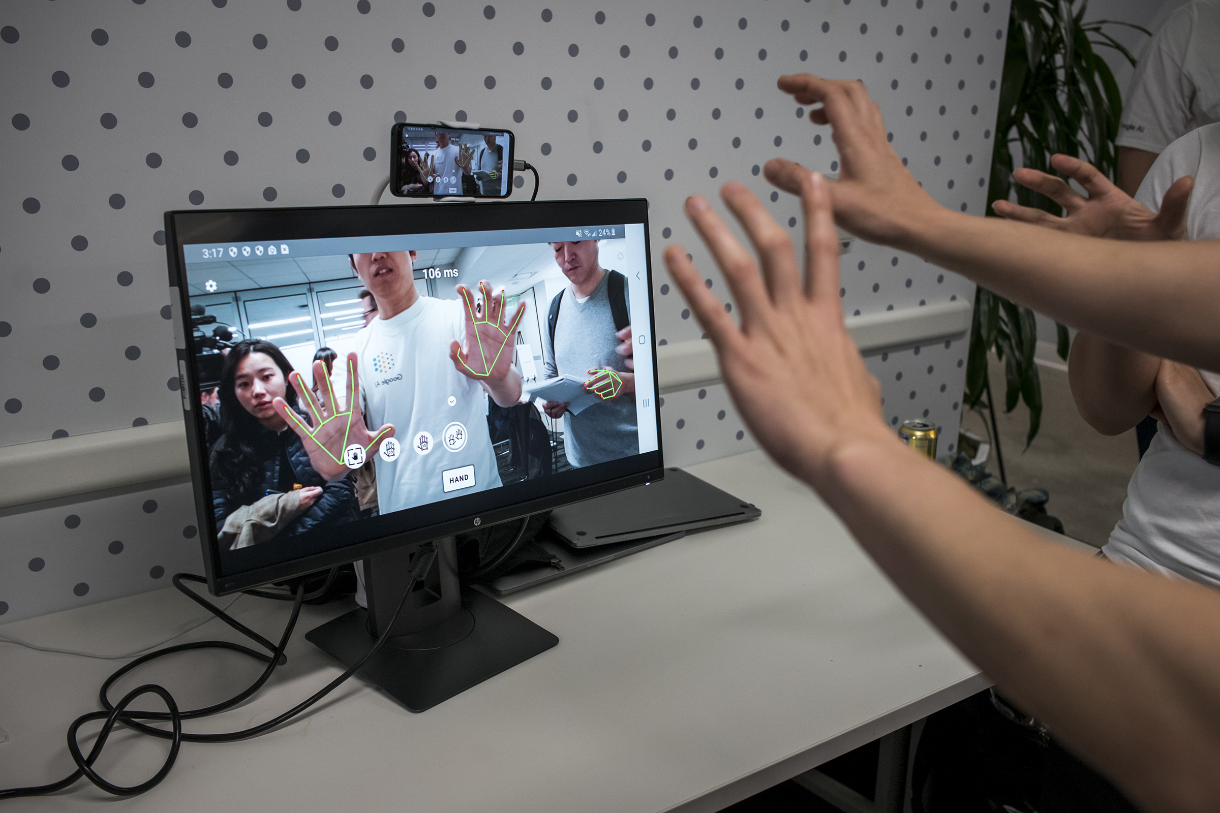 A 2020 demonstration of a Google AI that can recognize hands (David Paul Morris—Bloomberg/Getty Images)