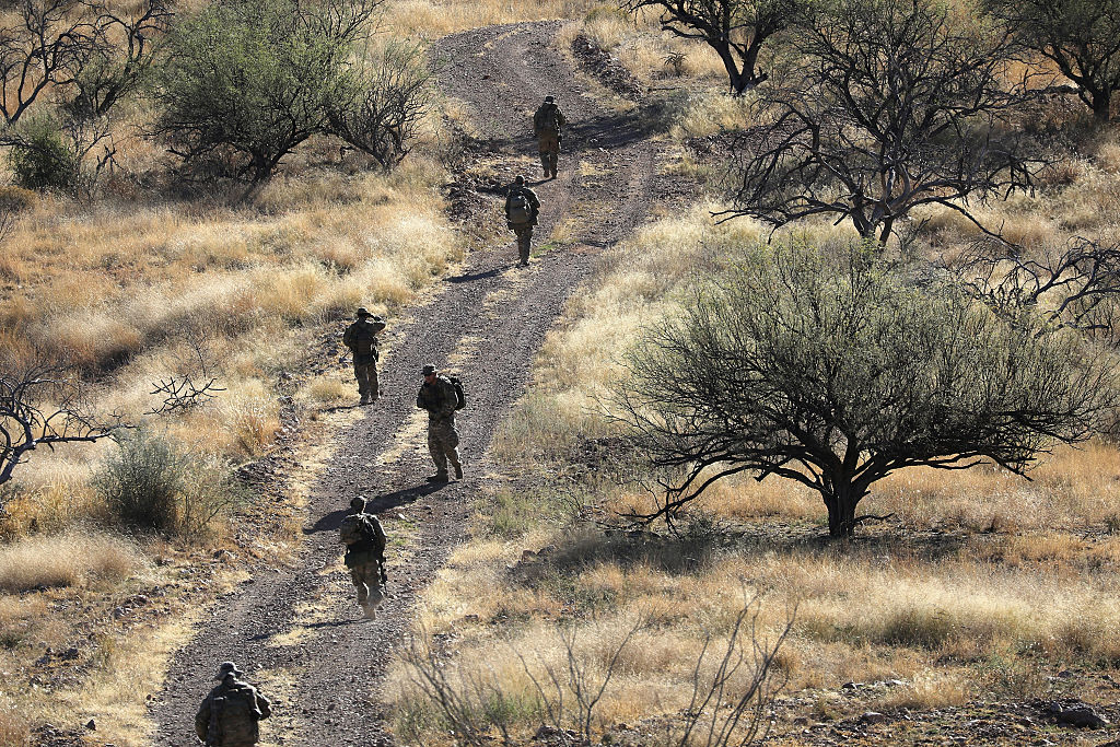 Members of Arizona Border Recon "patrol" the U.S.-Mexico border near Arivaca, Ariz. on on Nov. 14, 2016.