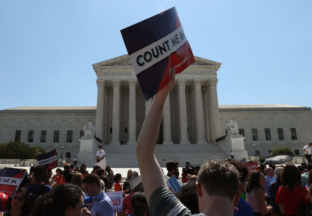 People gather in front of the U.S. Supreme Court after several decisions were handed down on June 27, 2019 in Washington, DC. The high court blocked a citizenship question from being added to the 2020 census for now, and in another decision ruled that the Constitution does not bar partisan gerrymandering. (Mark Wilson-Getty Images)