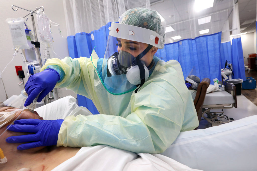 Catrina Rugar, 34, a contract nurse from Florida, responded first to hospitals in New York City then Texas' Rio Grande Valley after the COVID-19 pandemic hit in early 2020. (Carolyn Cole—Los Angeles Times/Getty)
