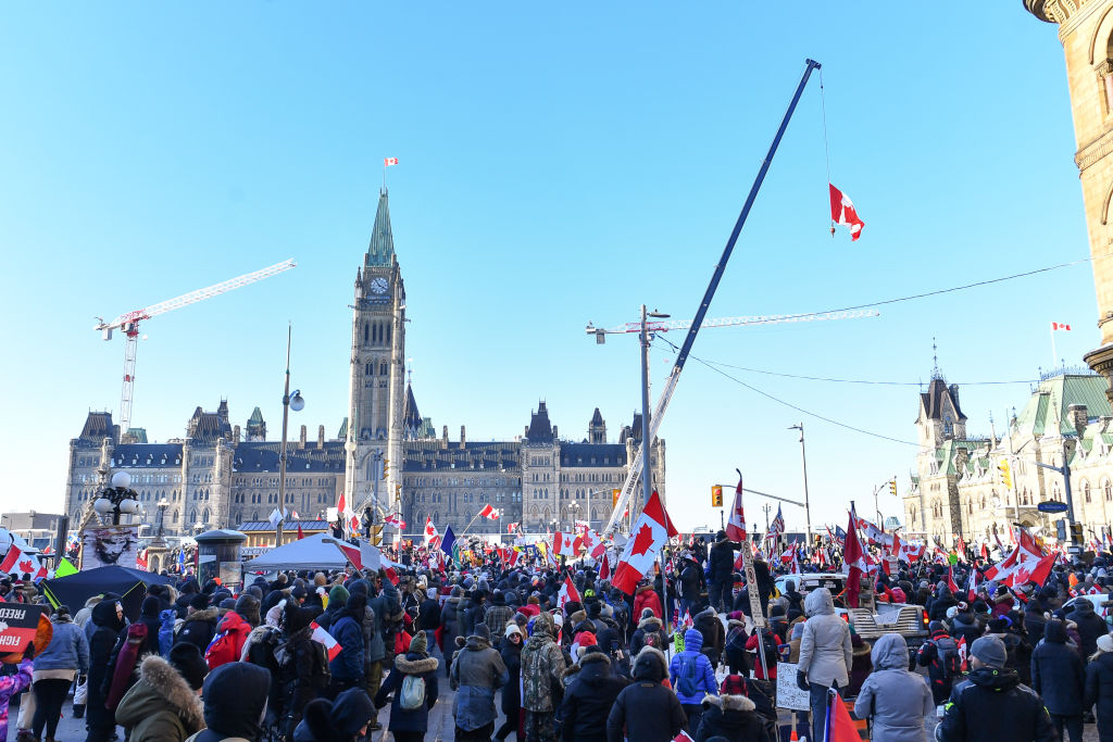 Thousands in support of the truckers gather on Wellington Street near Parliament Hill on Feb. 5, 2022 in Ottawa, Canada. (Minas Panagiotakis/Getty Images)