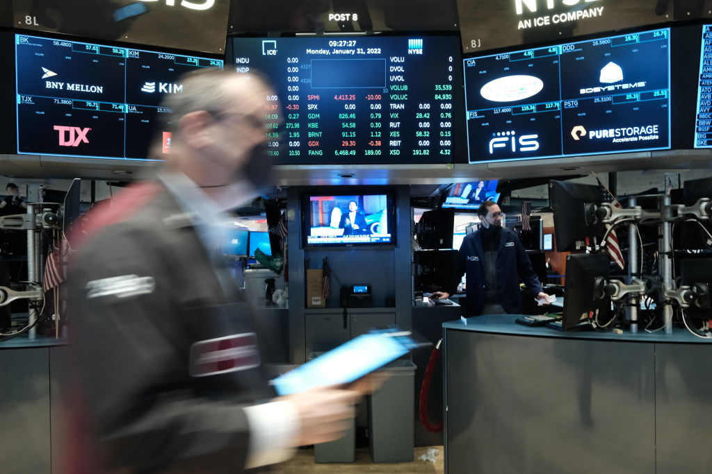 Traders work on the floor of the New York Stock Exchange (NYSE) on January 31, 2022 in New York City. After a volatile week, the Dow Jones Industrial Average was down slightly in morning trading. (Spencer Platt-Getty Images)
