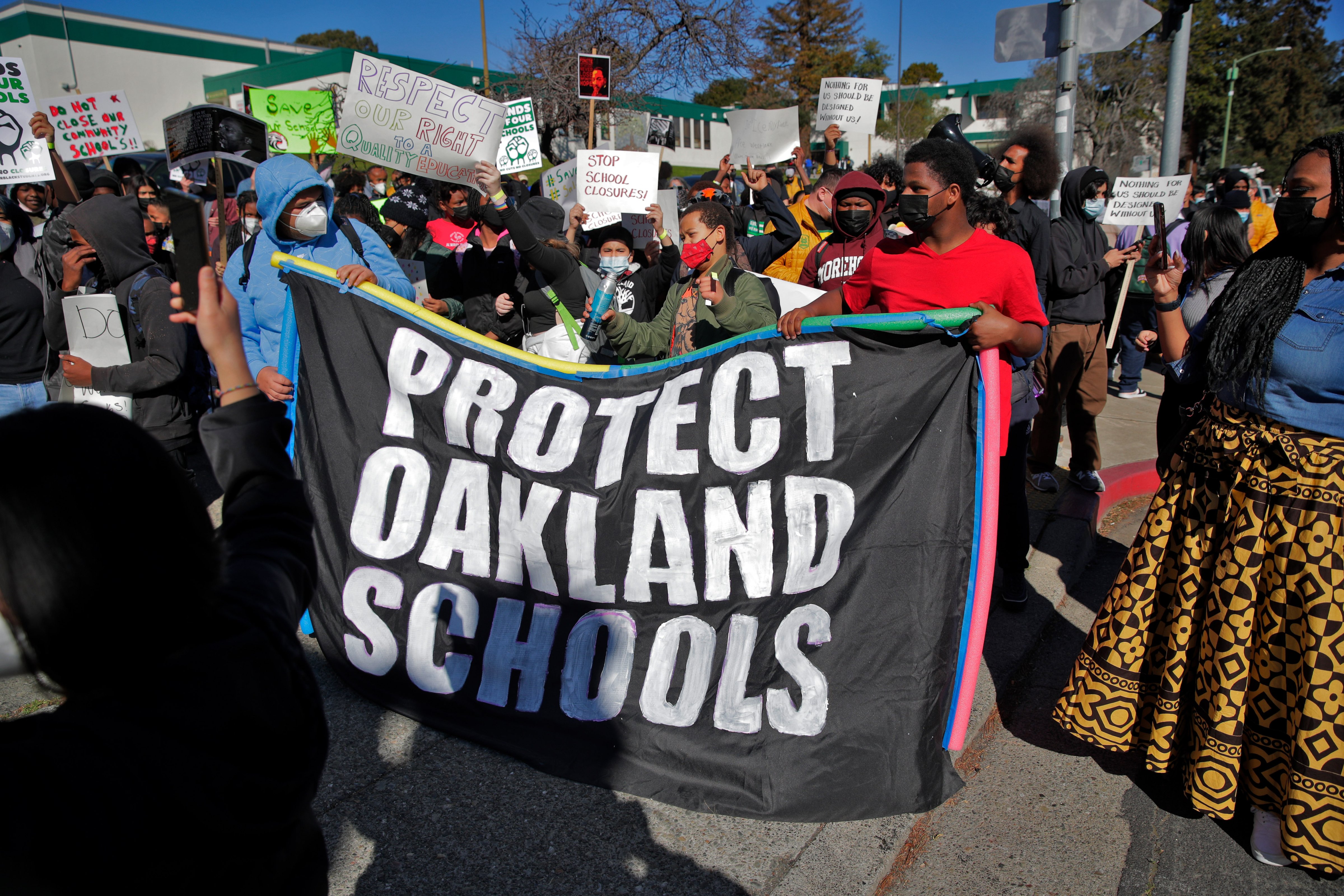 Protesters call for schools to remain open during a demonstration on Feb. 1 in Oakland, Calif., against plans to shut some schools due to declining enrollment. (Carlos Avila Gonzalez—San Francisco Chronicle /Getty Images)