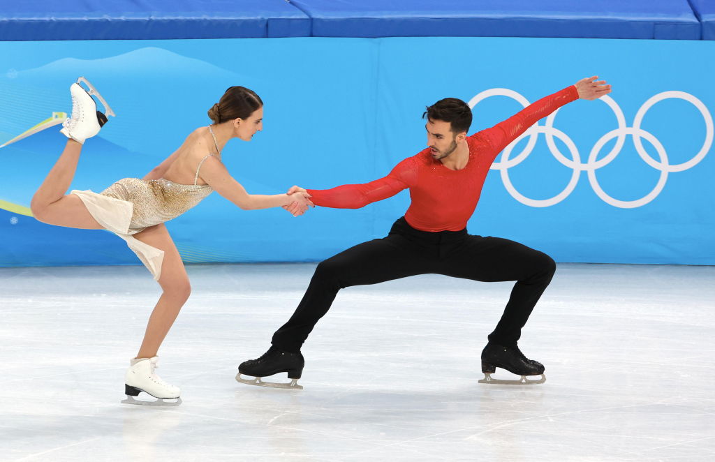 Gabriella Papadakis and Guillaume Cizeron of Team France skate during the Ice Dance Free Dance on day ten of the Beijing 2022 Winter Olympic Games at Capital Indoor Stadium on Feb. 14, 2022 in Beijing. They won gold in the event. (Xavier Laine–Getty images)
