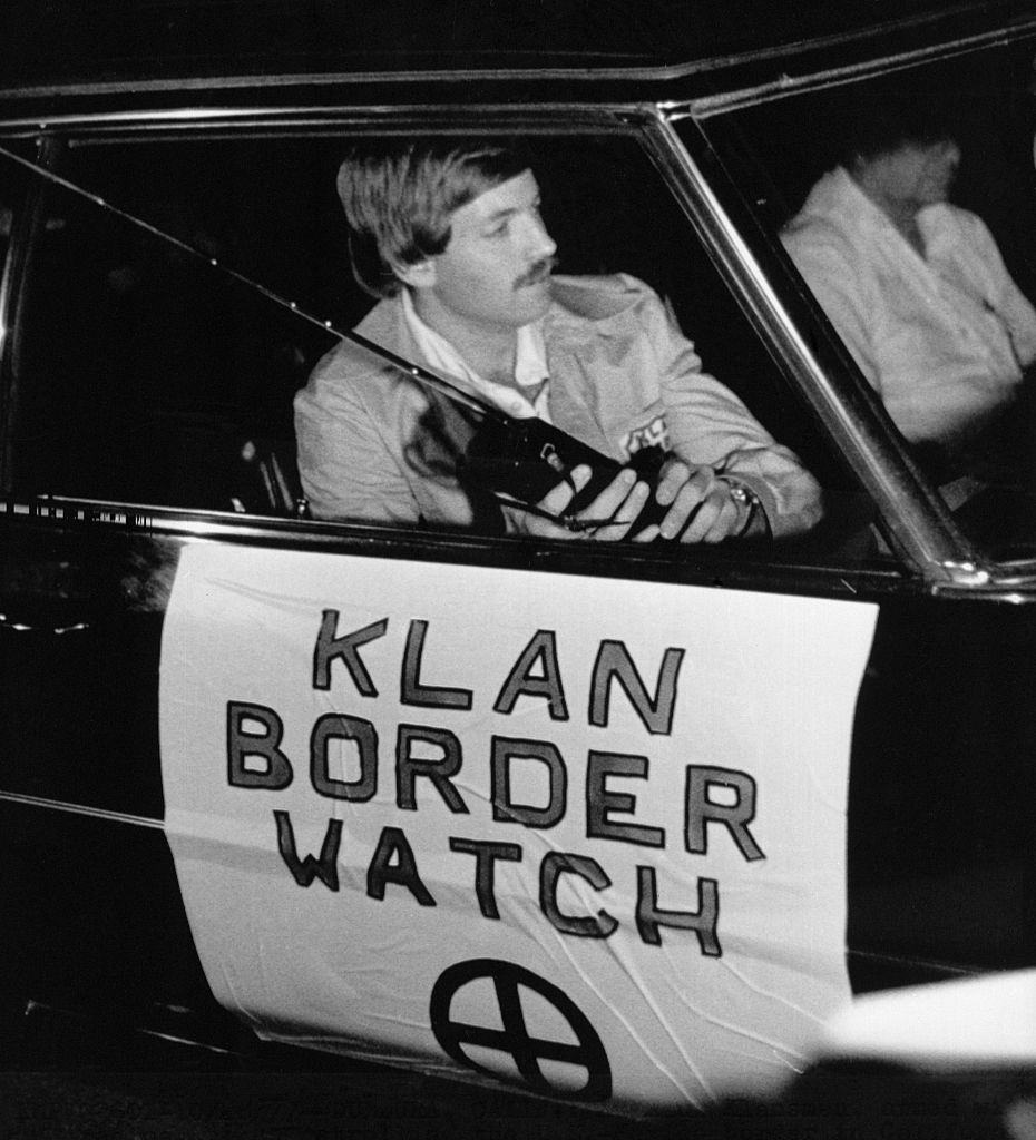 David Duke patrols the California-Mexico border in a vehicle marked, "Klan Border Watch" in 1977. (Bettmann Archive/Getty Images)