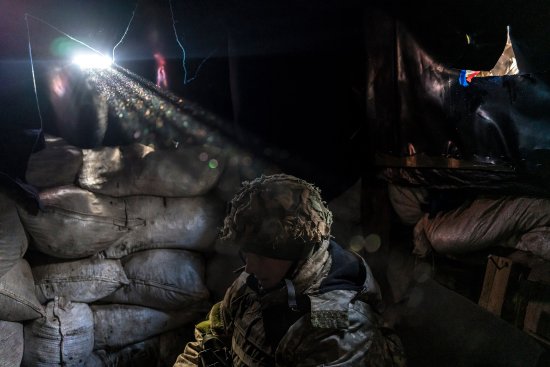A member of the Ukrainian army's 25th Airborne Brigade at a front-line position in the industrial zone in Avdiivka, Ukraine, Dec. 2, 2021. (Brendan Hoffman/The New York Times)