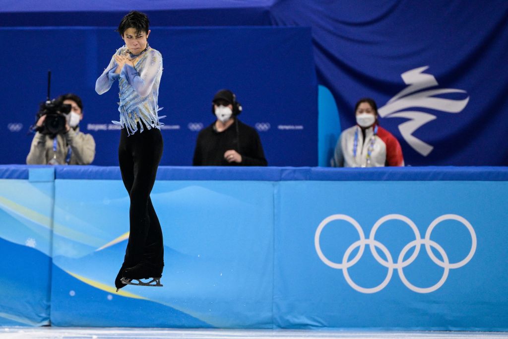 Japan's Yuzuru Hanyu competes in the men's single skating short program of the figure skating event during the Beijing 2022 Winter Olympic Games at the Capital Indoor Stadium in Beijing on Feb. 8, 2022. (Sebastien Bozon–AFP/Getty Images)