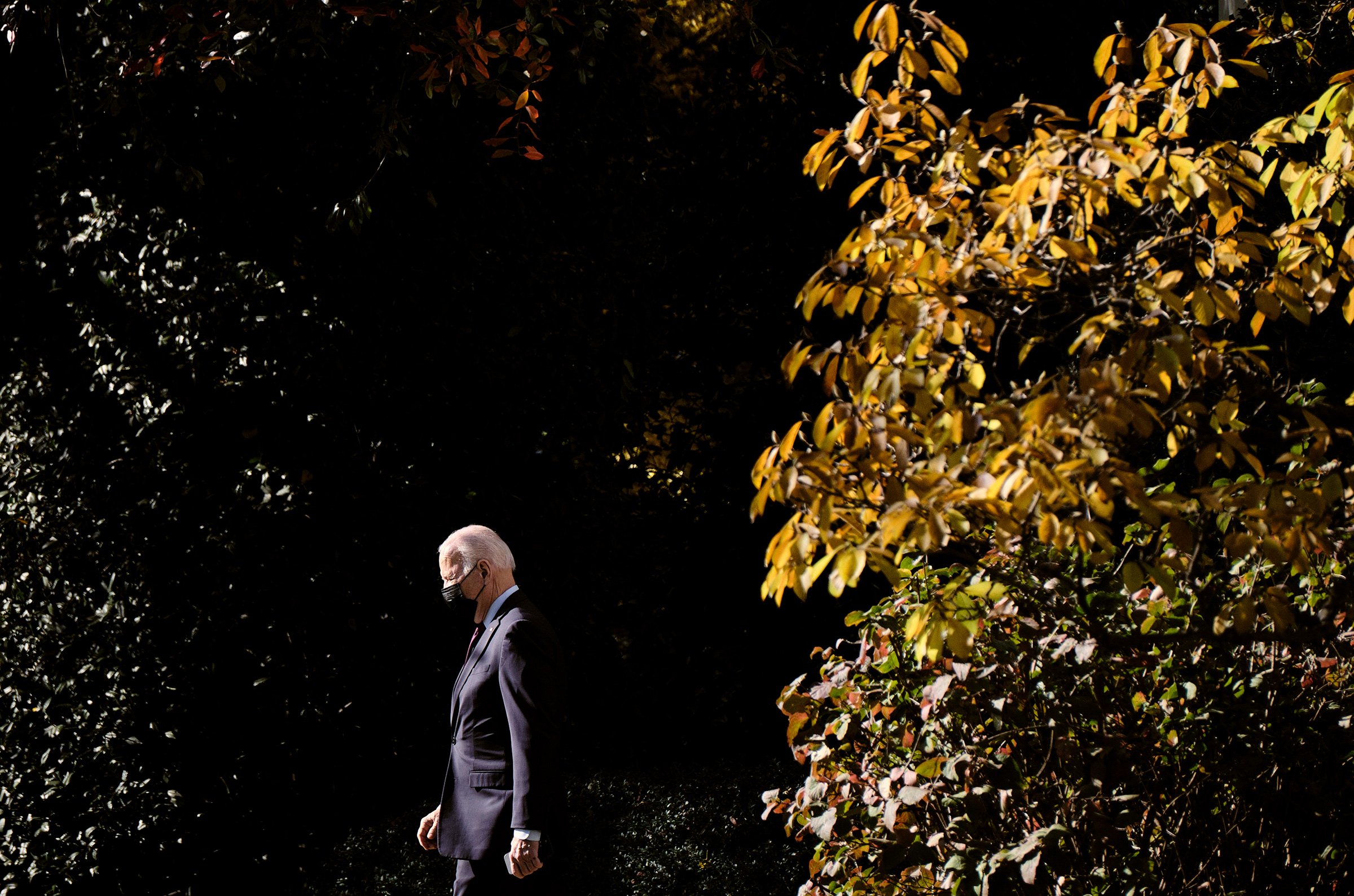 President Joe Biden walks to Marine One as he departs the White House in Washington for a day trip to Michigan on Nov. 17, 2021. (T.J. Kirkpatrick/The New York Times)