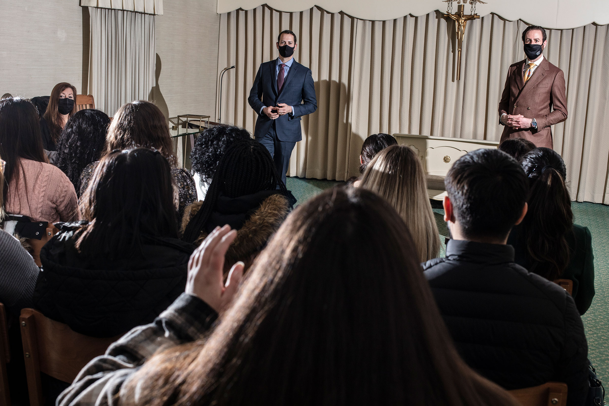 Funeral directors Aaron Tirpack (left) and Frank Galante (right) speak to students during a Kean University course on death at Galante Funeral Home in Union, N.J., on Wednesday, February 2, 2022.CREDIT: Bryan Anselm/Redux for TIME