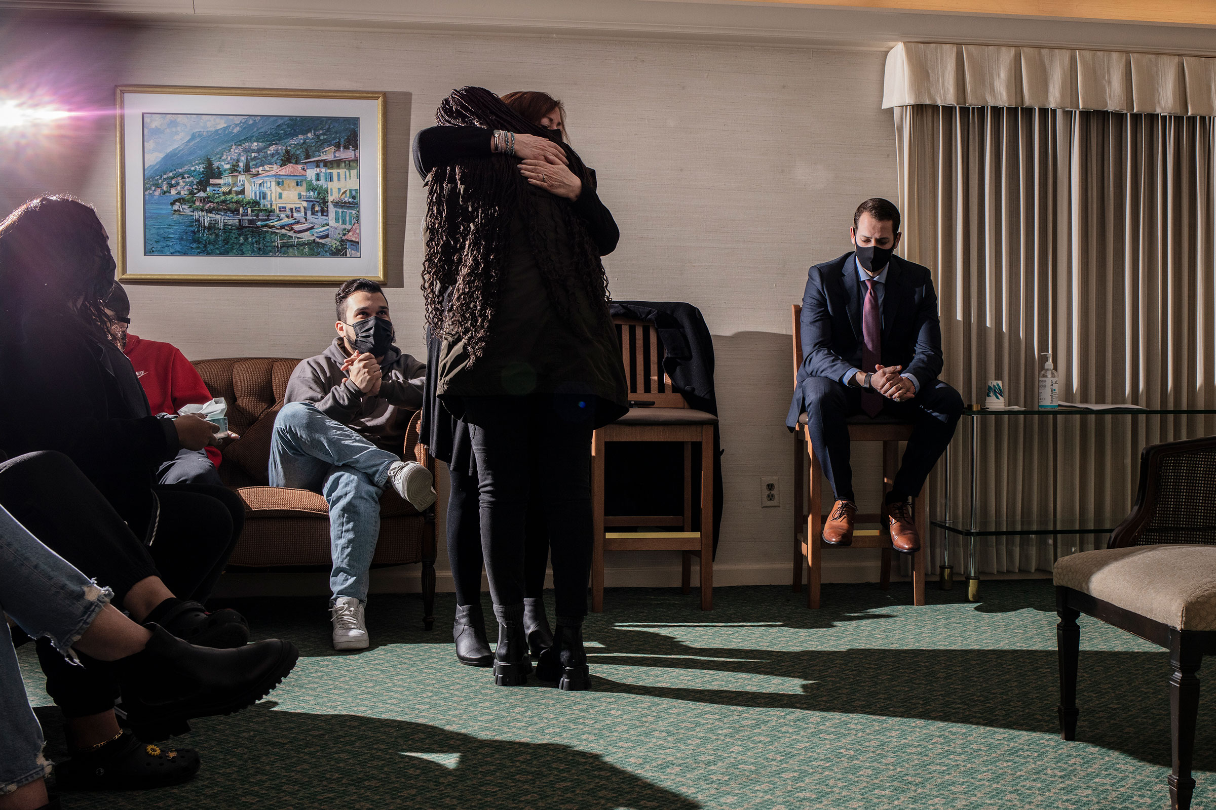 Professor Norma Bowe hugs a crying student after she read a testimonial about death she wrote for a class assignment during a Kean University course on death at Galante Funeral Home in Union, N.J., on Wednesday, February 2, 2022.CREDIT: Bryan Anselm/Redux for TIME