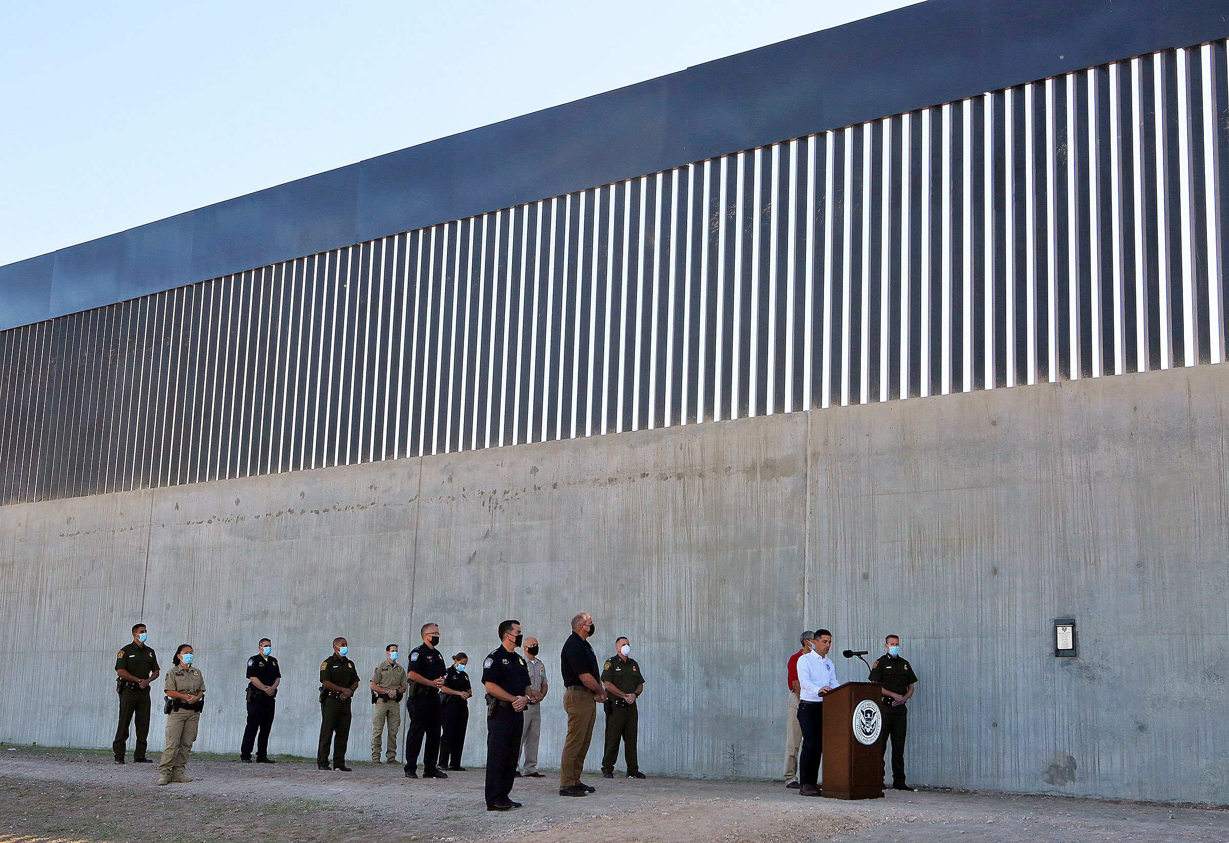 Acting Homeland Secretary Chad Wolf gives a speech in front of a new section of the border wall Thursday, Oct. 29, 2020, in McAllen, Texas. (Joel Martinez—The Monitor/AP)