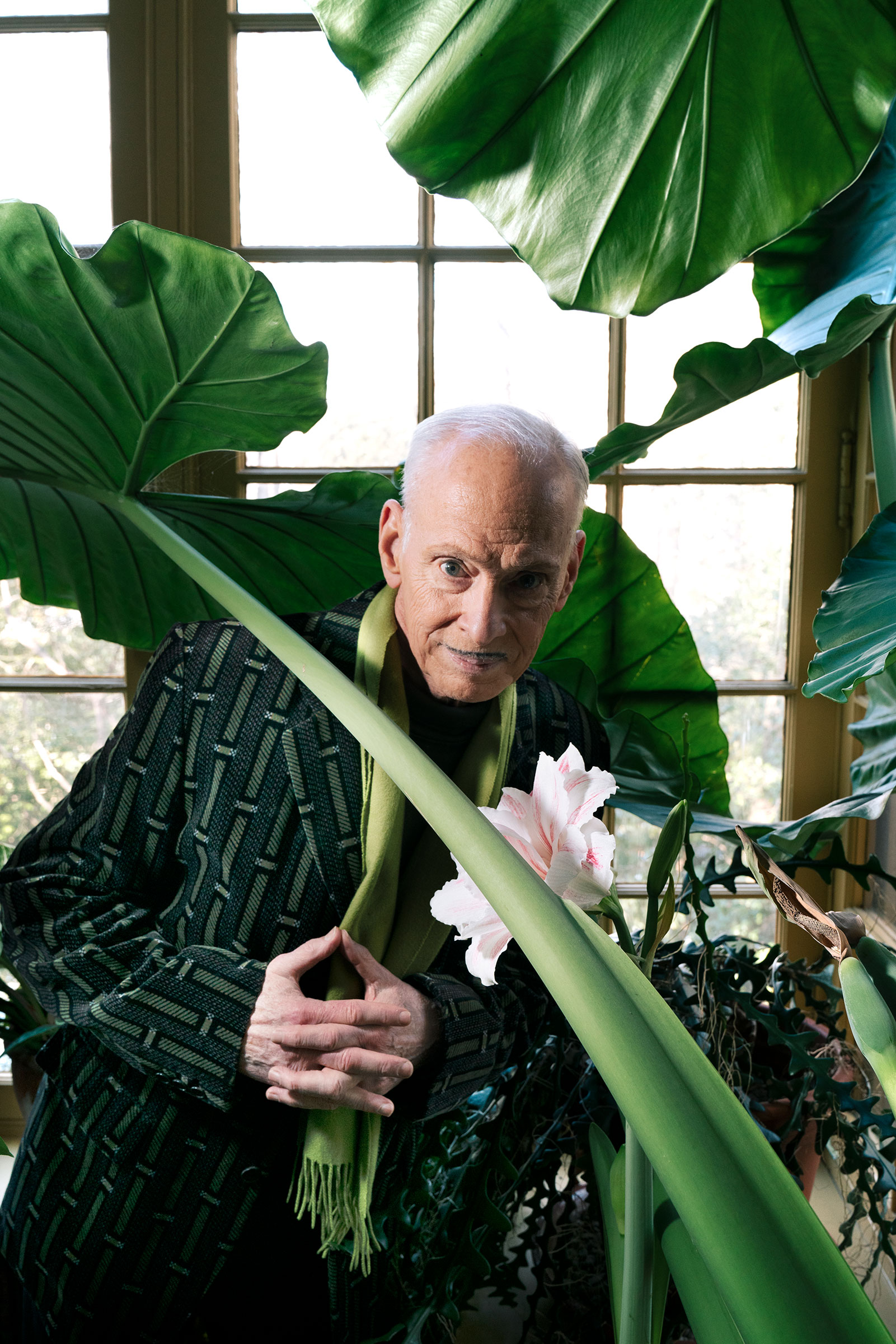 BALTIMORE, MD - FEBRUARY 14, 2022: Portrait of director and writer, John Waters, in his Baltimore home. CREDIT: Peter Fisher for TIME