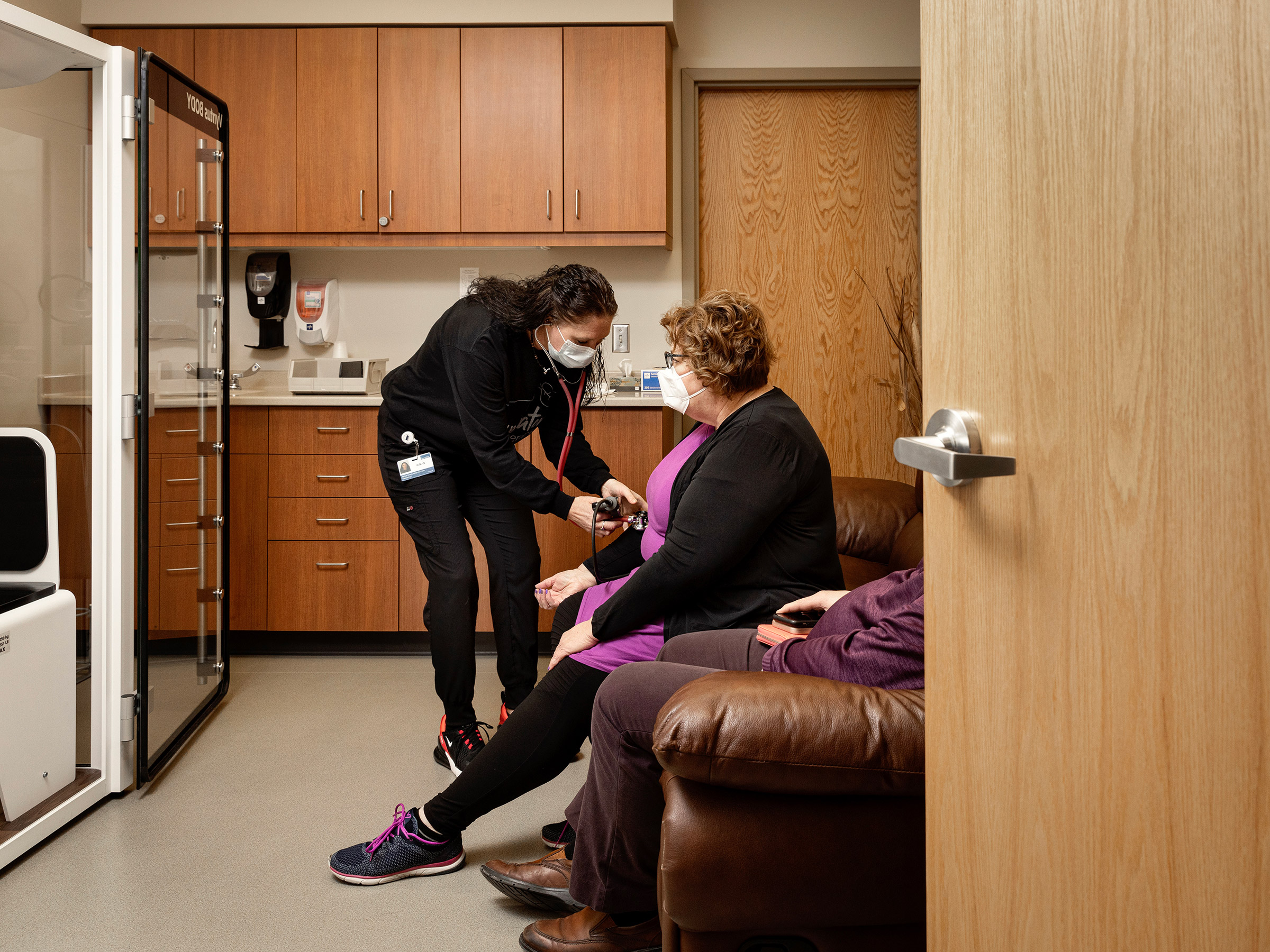Amber Rausch’s blood pressure is taken during Long COVID testing (Rebecca Stumpf for TIME)