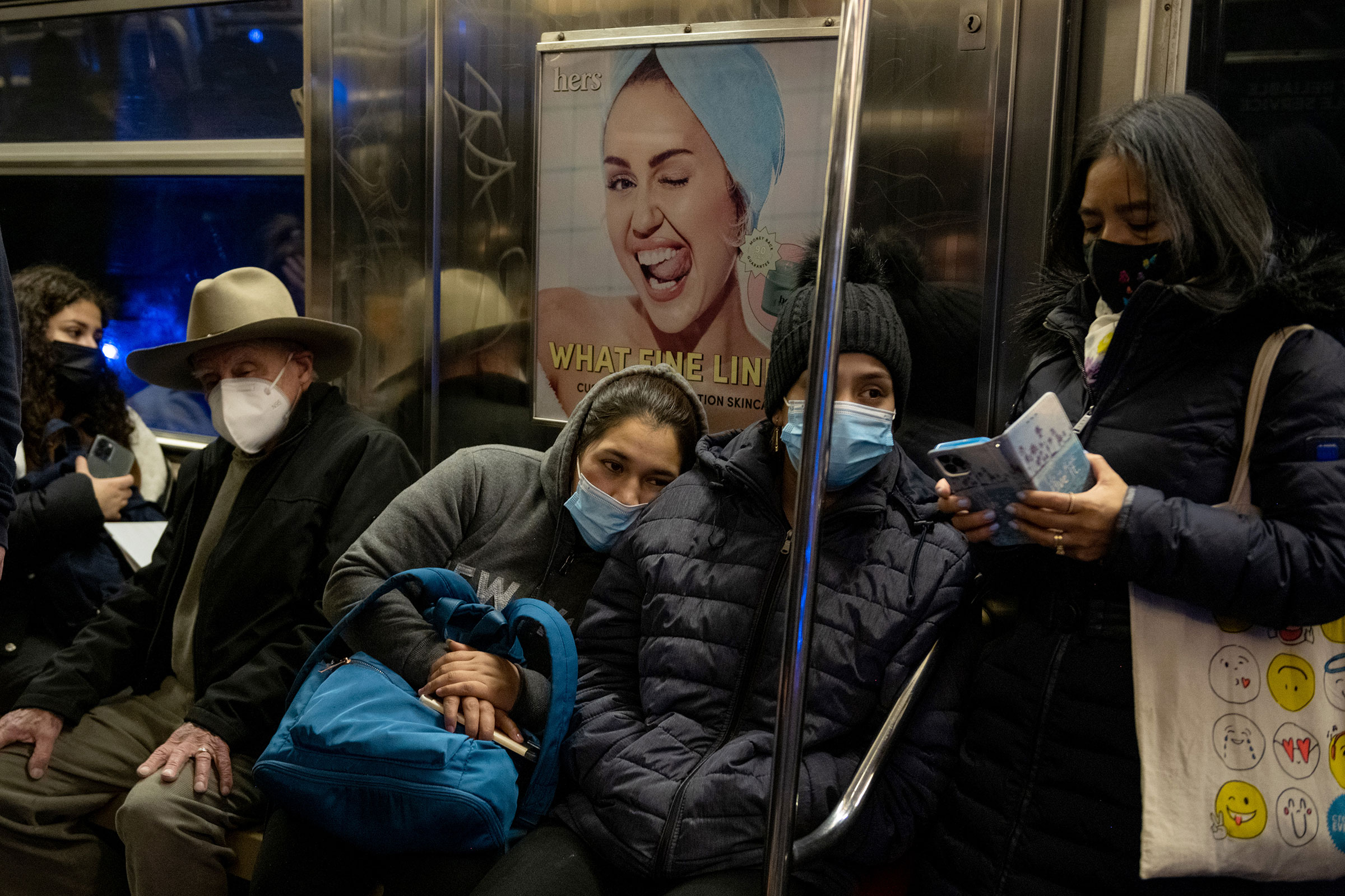 People wear masks while riding the subway in New York City on Nov. 17, 2021. (Alexi Rosenfeld—Getty Images)