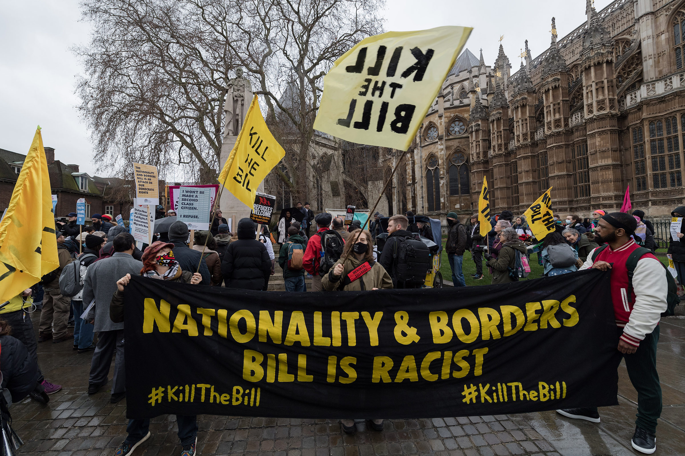 Activists stage a protest outside Houses of Parliament against the Nationality and Borders Bill in London on Jan. 27, 2022. (Wiktor Szymanowicz—Future Publishing/Getty Images)