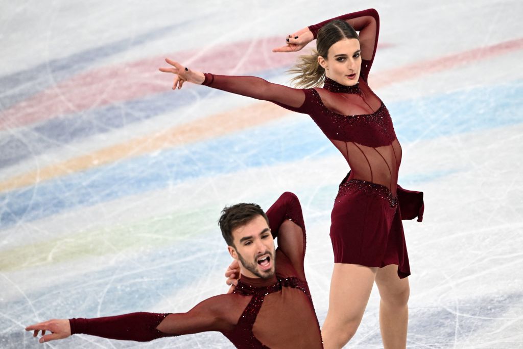 Gabriella Papadakis and Guillaume Cizeron train during the Beijing 2022 Winter Olympic Games in Beijing on Feb. 9, 2022. (Anne-Christine Poujoulat—AFP via Getty Images)