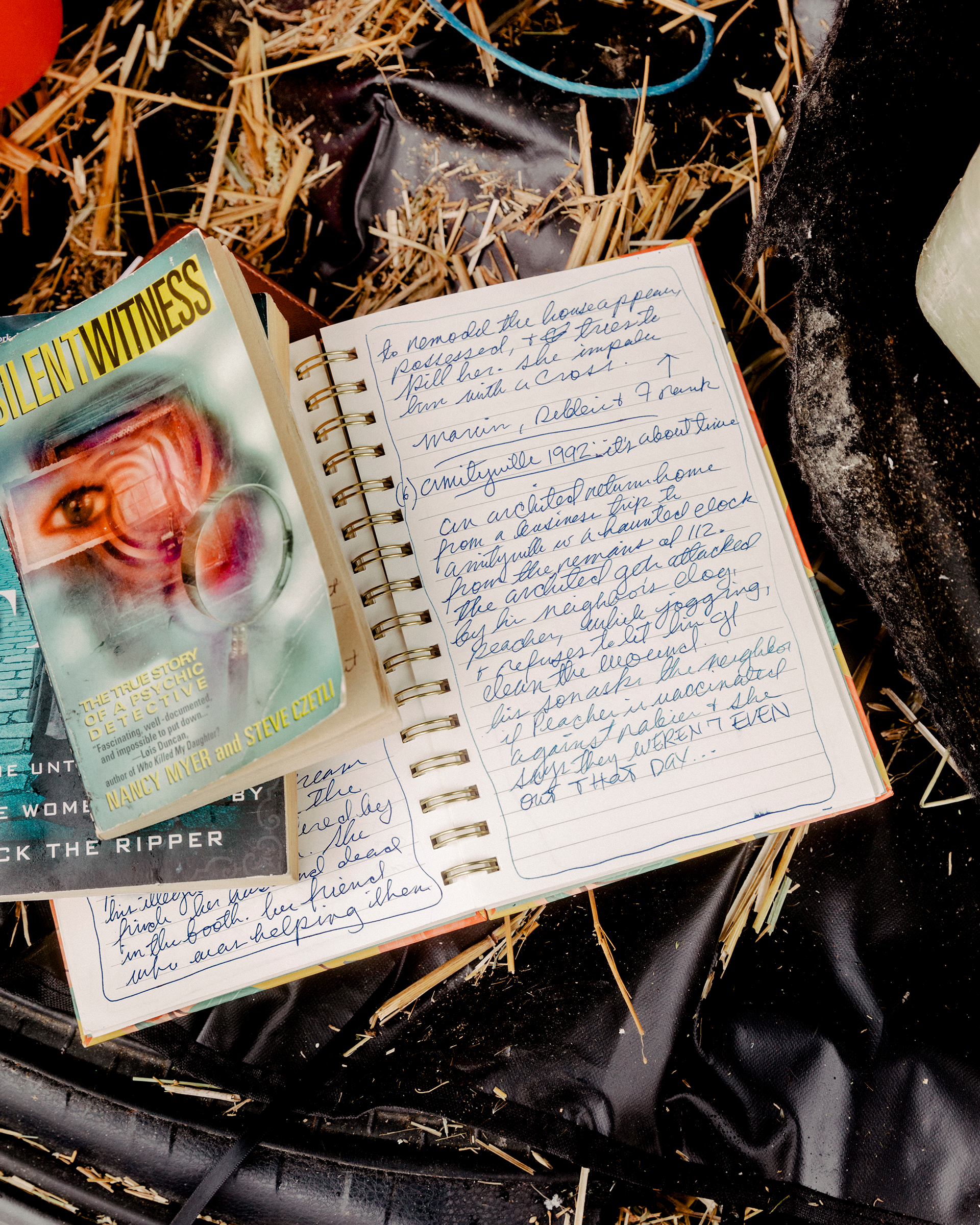 Marquette, Michigan. February 16, 2022. Author and podcaster Sarah Marshall's notebooks and research books are with her wherever she goes. Here they accompany her in her vehicle to Marquette, Michigan where she is currently doing research for a new project.