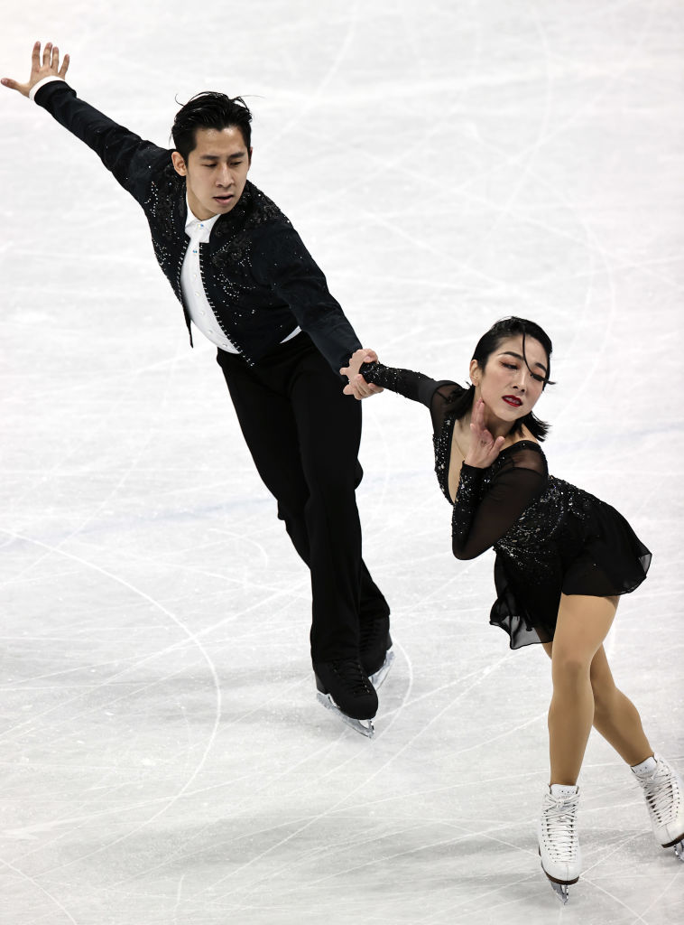 Sui Wenjing and Han Cong of Team China skate during the Pair Skating Short Program on day fourteen of the Beijing 2022 Winter Olympic Games at Capital Indoor Stadium on Feb. 18, 2022 in Beijing, China. (Wang Xianmin—CHINASPORTS/VCG via Getty Images)