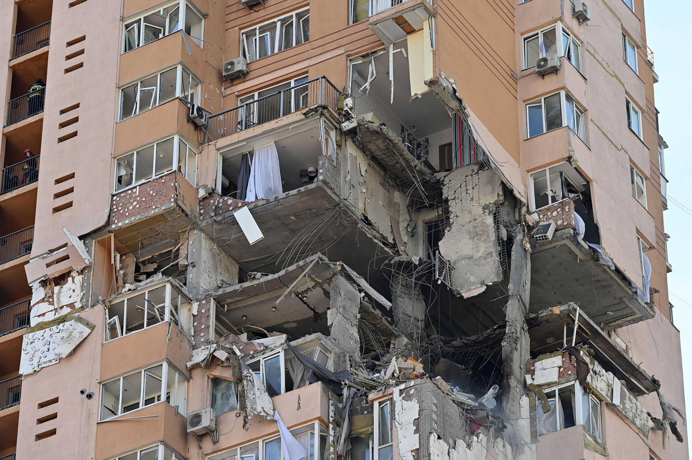 A view of a high-rise apartment block which was hit by recent shelling in Kyiv on Feb. 26.