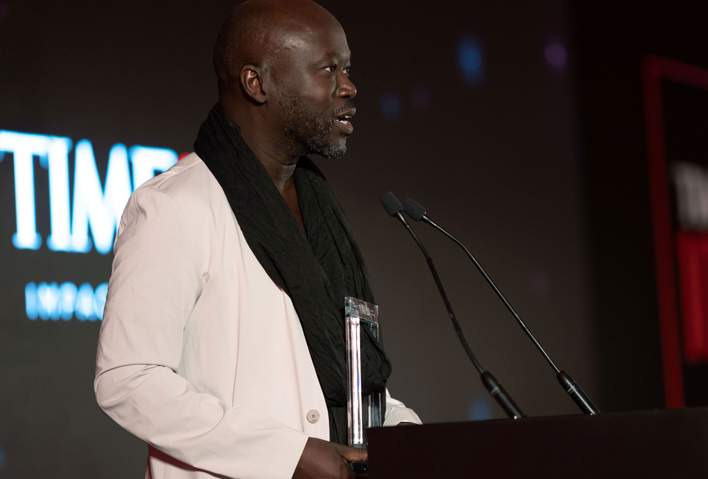 David Adjaye accepts the TIME 100 Impact Award at the Museum of the Future in Dubai on March 28, 2022. (Pause Films / Igor Moskalenko)