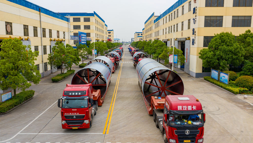 Trucks in Hai 'an City, Jiangsu Province, China, line up with building materials for export to Uzbekistan on May 29, 2020. (Costfoto/Future Publishing via Getty Images)
