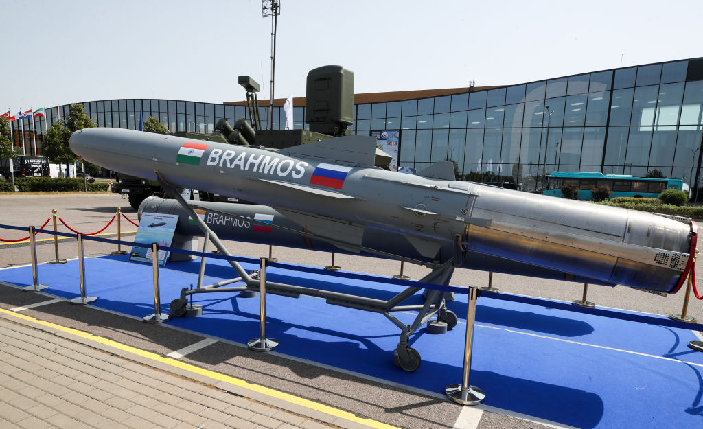 A BrahMos medium-range ramjet supersonic cruise missile, bearing Indian and Russian flags, on display at the 10th International Maritime Defense Show in St. Petersburg on June 23, 2021. (Alexander Demianchuk TASS via Getty Images)