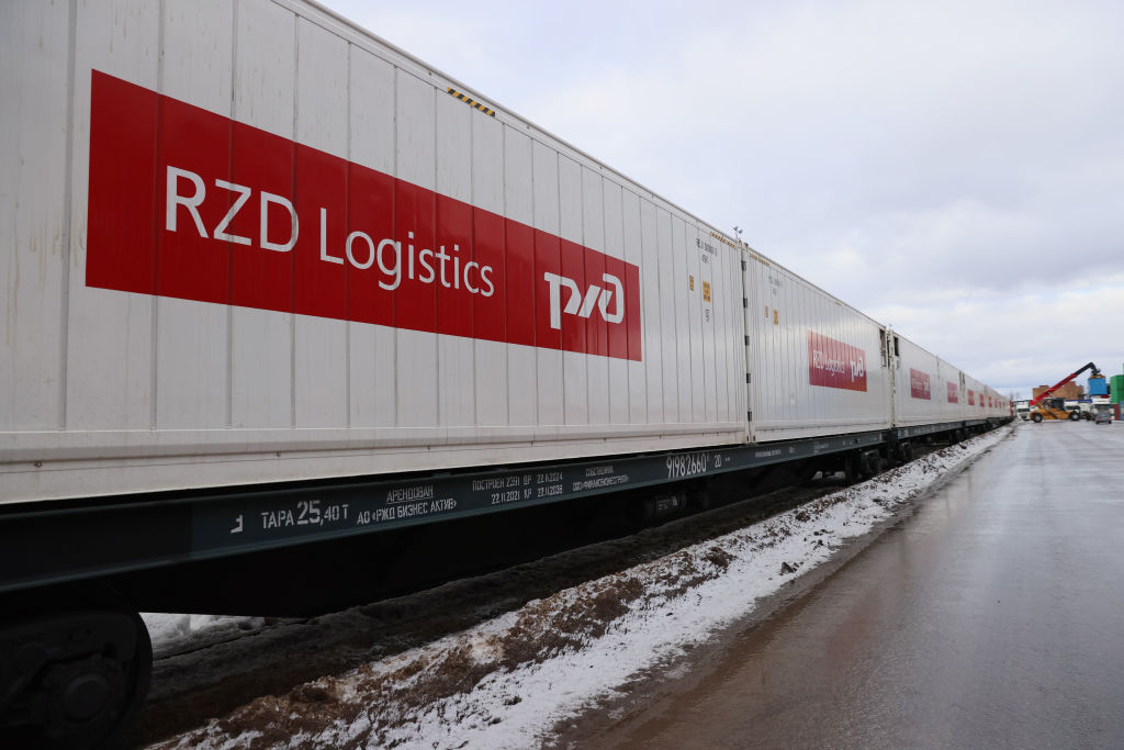 After traveling on a new route from China, a container train carrying food and medical supplies from Shandong province arrives at Terminal Selyatino, outside Moscow, on Feb. 20, 2022. (Sergei Savostyanov TASS via Getty Images)