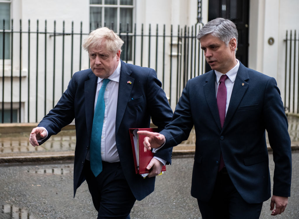 LONDON, ENGLAND - MARCH 02: British Prime Minister Boris Johnson (L) and Ukrainian Ambassador to the UK Vadym Prystaiko (R) leave Downing Street together to attend Prime Ministers Questions at the Houses of Parliament on March 2, 2022 in London, England. (Chris J Ratcliffe/Getty Images)