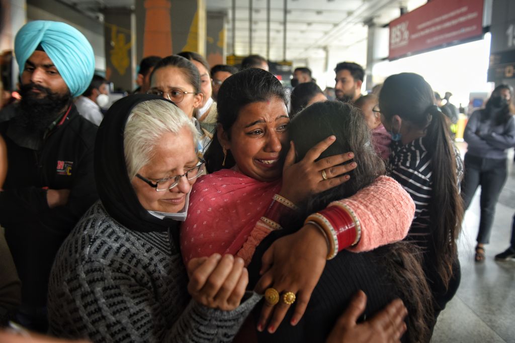 Parents welcome Indian students evacuated from Ukraine, at Terminal 3, Indira Gandhi International Airport on Mar. 3, 2022 in New Delhi, India. (Sanchit Khanna/Hindustan Times via Getty Images)