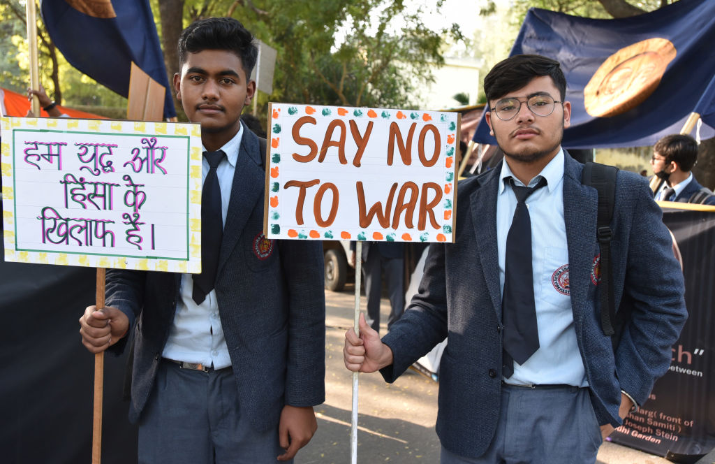 Social activists, school/college students and members of the Gandhi Mandela Foundation call for an end to the war between Russia and Ukraine at Jantar Mantar, on March 3, 2022 in New Delhi, India. (Sonu Mehta/Hindustan Times via Getty Images)