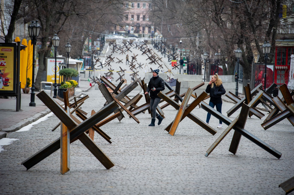 People walk among anti-tank barriers placed to protect historic landmarks in expectation of a Russian assault on the strategic Black Sea port city on March 14, 2022 of Odessa, Ukraine. (Scott Peterson-Getty Images)