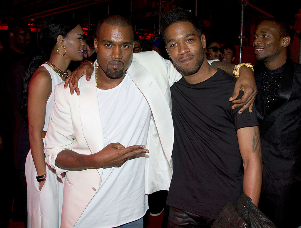 Kanye West and Kid Cudi at the Cannes Film Festival in 2012. (Getty Images for Belvedere—2012 Marc Piasecki)