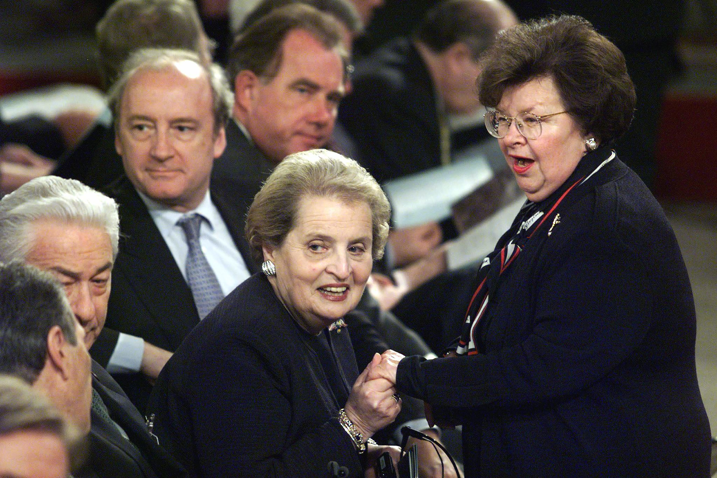 Madeleine Albright and Representative Barbara Mikulski greet each other at the commemorative ceremony of the NATO Summit in Washington on April 23, 1999. (Stephen Jaffe—AFP/Getty Images)