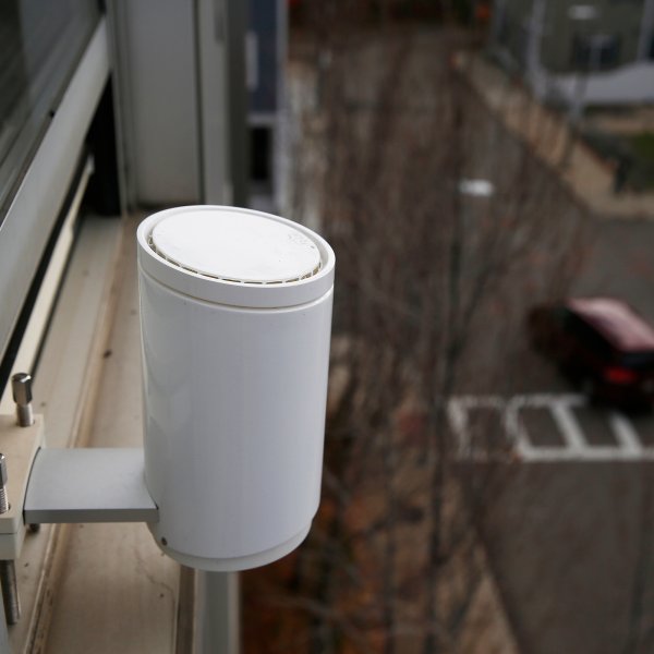 A Starry point wireless router that would serve local wifi for the new high-speed wireless broadband service is seen outside of the window at Starry Internet in Boston.