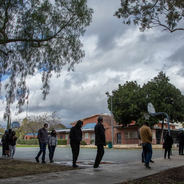 People wait in line for COVID-19 testing at San Fernando Recreation Park on Monday, Dec. 27, 2021. In L.A. County, new coronavirus cases are dramatically increasing