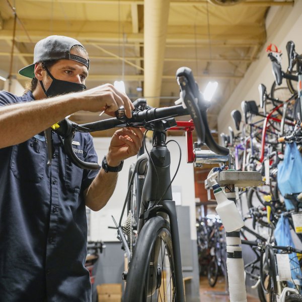 A mechanic assembles a bike at the Trek Bicycle Shop in San Diego, California, U.S., on Friday, May 15, 2020.