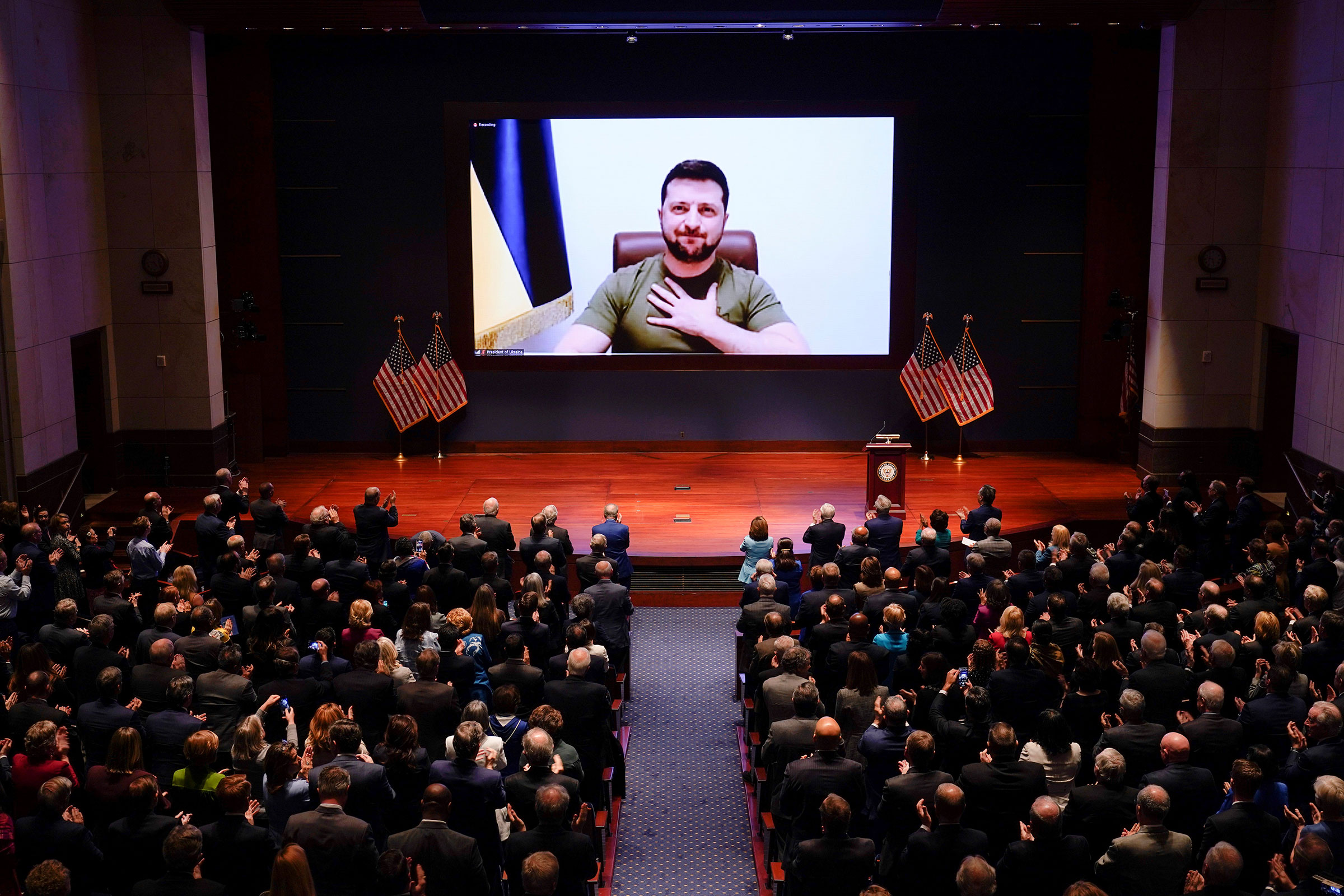 Ukrainian President Volodymyr Zelensky is seen on the screen delivering a speech via videoconference to the U.S. Congress at the Capitol in Washington,  on March 16, 2022. (J. Scott Applewhite—Pool/Xinhua/Getty Images)