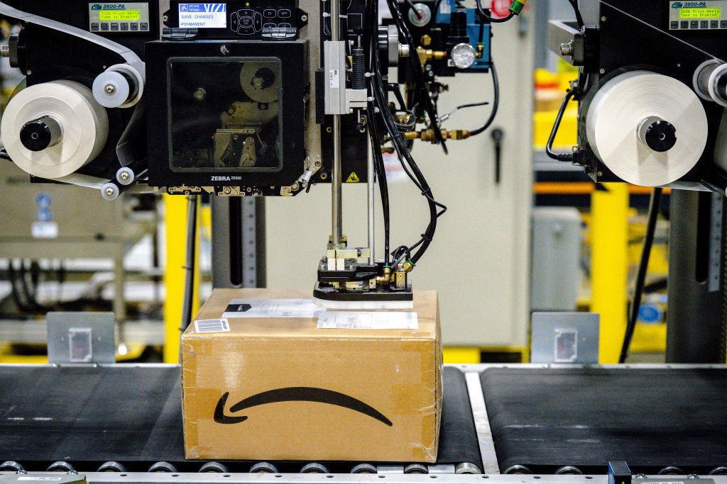 A package on the conveyor belt gets its label at Amazon fulfillment center in Eastvale on Tuesday, Aug. 31, 2021. (Watchara Phomicinda–MediaNews Group/The Press-Enterprise via Getty Images)