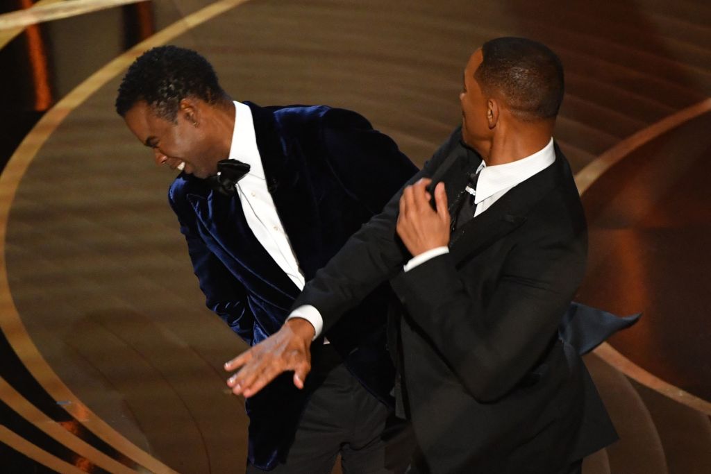 Will Smith slaps US actor Chris Rock onstage during the 94th Oscars. (AFP via Getty Images)