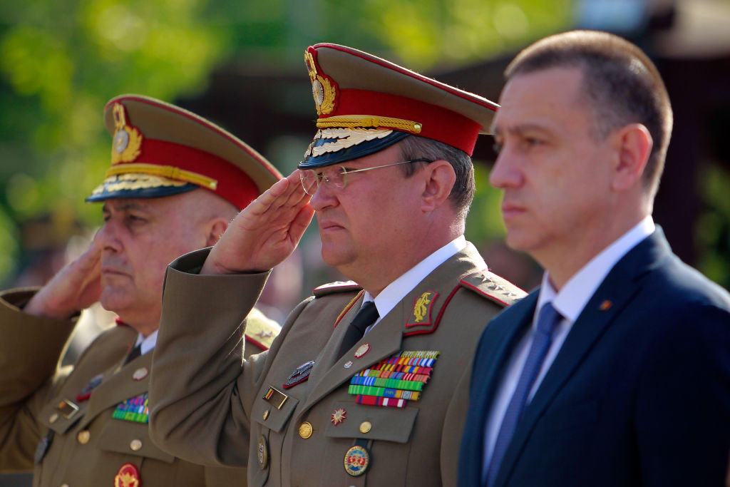 Nicolae Ciuca (center), then Romania's Chief of General Staff, attends a ceremony marking Romanian Land Forces Day at Fallen Heroes Memorial, in Bucharest, on April 23, 2018. (Cristian Cristel—Xinhua News Agency/Getty Images)
