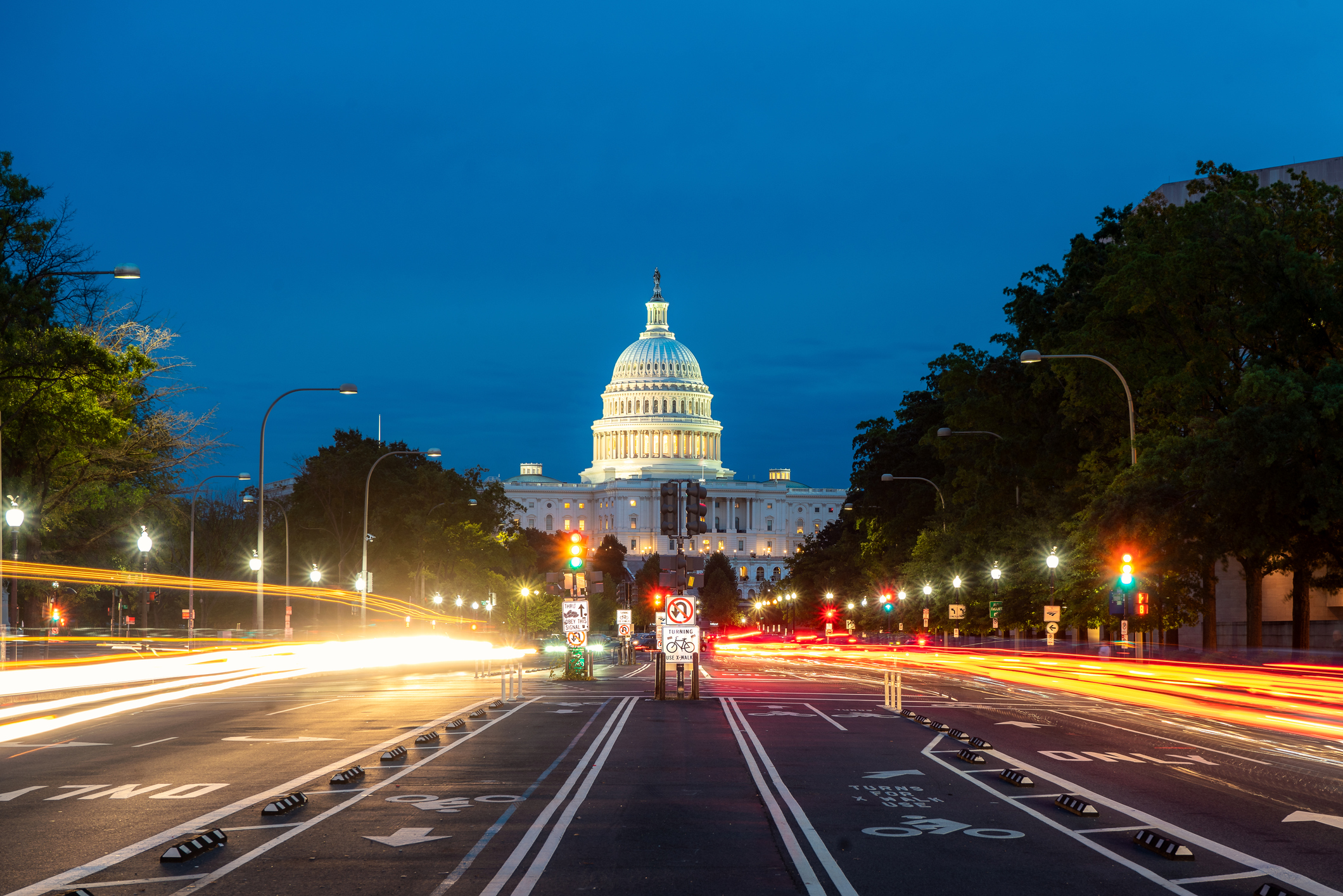The United States Capitol building at night in Washington DC, USA.
