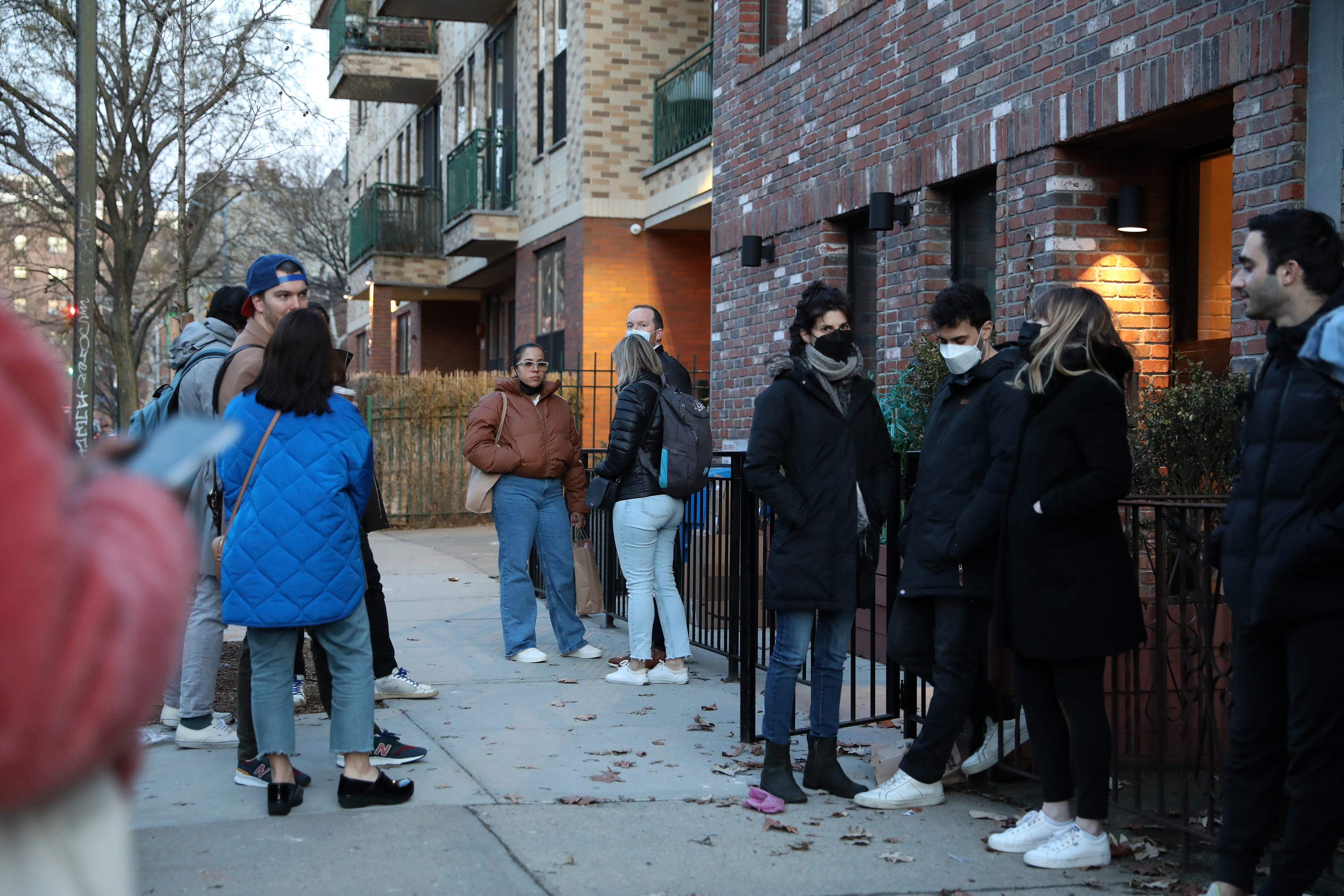 Prospective renters wait outside to enter an apartment unit during an open house in the Williamsburg neighborhood in the Brooklyn borough of New York, U.S. (Bess Adler—Bloomberg/Getty Images)