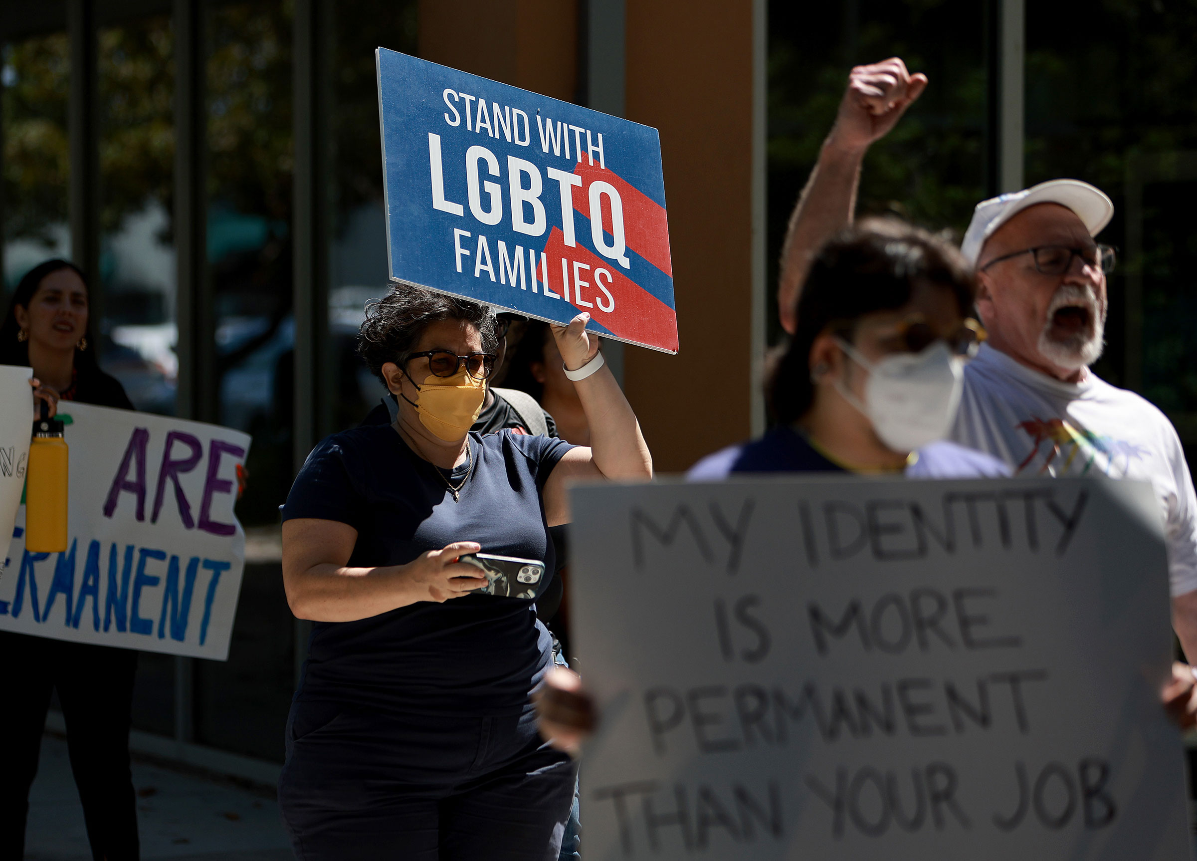 People protest in front of Florida State Senator Ileana Garcia's office after the passage of the Parental Rights in Education bill in Miami, on March 9, 2022.