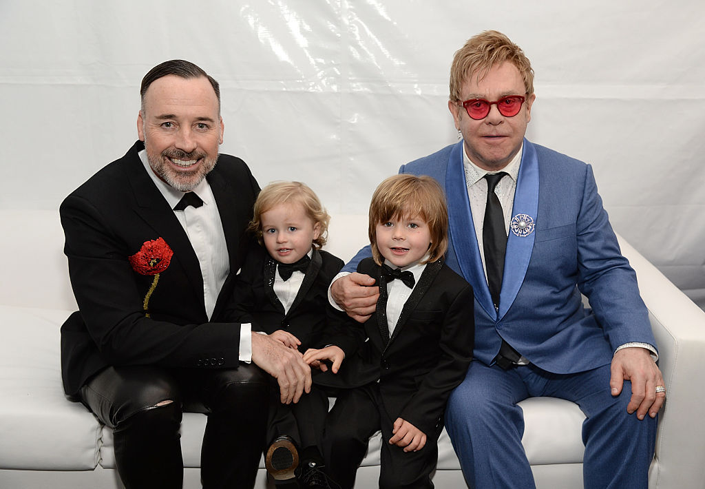 David Furnish, Elton John, and their sons Elijah and Zachary attend the 23rd Annual Elton John AIDS Foundation Academy Awards Viewing Party on Feb. 22, 2015 in Los Angeles, California. (Photo by Michael Kovac/Getty Images for EJAF) (Getty Images for EJAF-2015 Michael Kovac)
