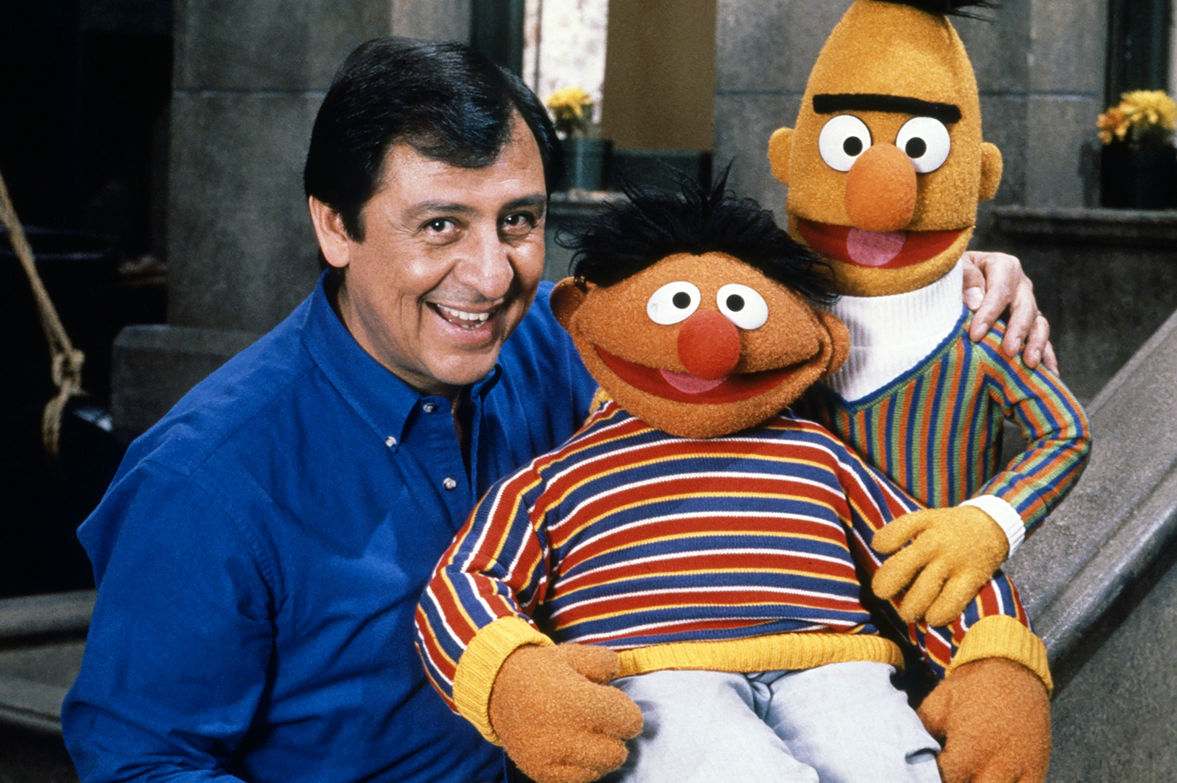 Emilio Delgado with Ernie and Bert in the '90s on Sesame Street (Richard Termine—PBS/Everett Collection)