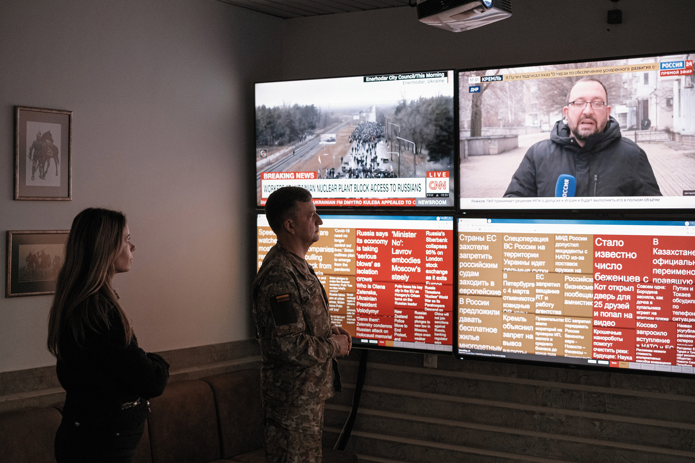 Tomas Čeponis, Senior Specialist in the Counter-Hybrid Response Group, and Dominyka Daškevičiūtė, Analyst at the Lithuanian Armed Forces, analyse daily information from different channels and sources. Vilnius, Lithuania.