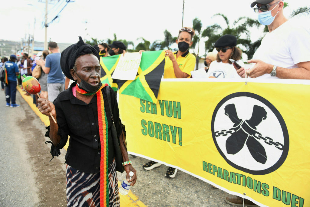 People calling for slavery reparations, protest outside the entrance of the British High Commission during the visit of the Duke and Duchess of Cambridge in Kingston, Jamaica on March 22 2022. (Ricardo Makyn—AFP/Getty Images)