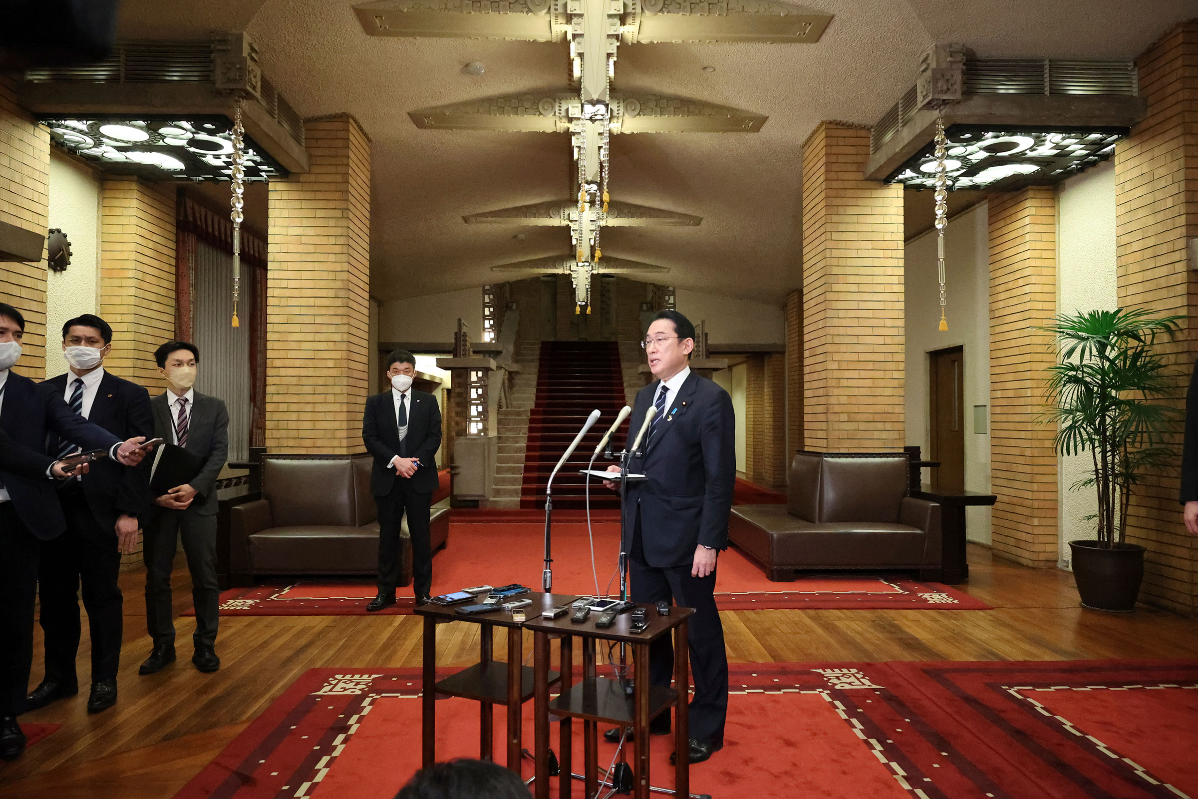 Japanese Prime Minister Fumio Kishida speaks to reporters before leaving for Brussel to attend the G7 Emergency Summit at the prime minister's residence in Tokyo on March 23, 2022. G7 nations will discuss Ukraine crisis and Japan will unveil a new sanction against Russia at the summit meeting. (The Yomiuri Shimbun/AP)
